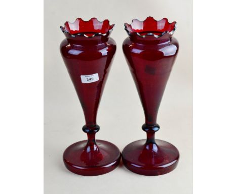 A pair of Victorian tall ruby glass vases, of baluster urn form with waved rims, 33 cm (13 1/2 in) high