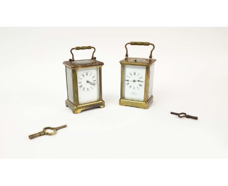 TWO CARRIAGE CLOCKS, compromising a dent repeater carriage clock, striking on a gong, together with a further carriage clock,