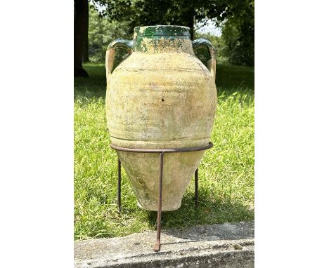 GARDEN AMPHORA, vintage weathered terracotta with moulded loop handles and glazed neck on iron stand, 64cm H. 