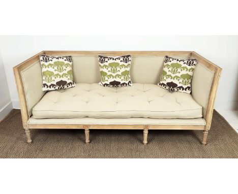 SOFA, Louis XVI style bleached cherrywood, in neutral upholstery, with squab and scatter cushions, on carved fluted legs, 84c