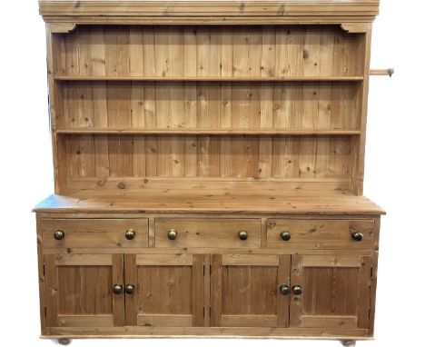 Large vintage pine 4 door, 3 drawer dresser, approximate measurements: Height 79 inches, length 77 inches, Depth 18 inches