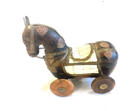 Small wooden troy horse inlaid with mother of pearl detail, approximate measurements: Height 6.5 inches, length 7 inches