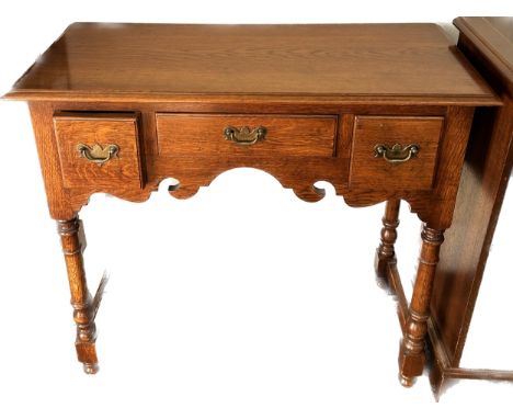 Oak 3 drawer console table, approximate measurements: Height 29 inches, Width 33 inches, Depth 15 inches