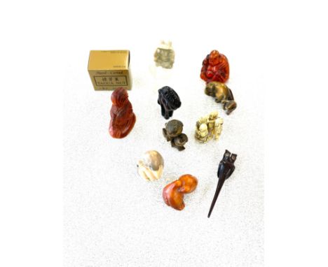 Large selection of assorted vintage and later oriental figures includes Carved Tagua nut etc 
