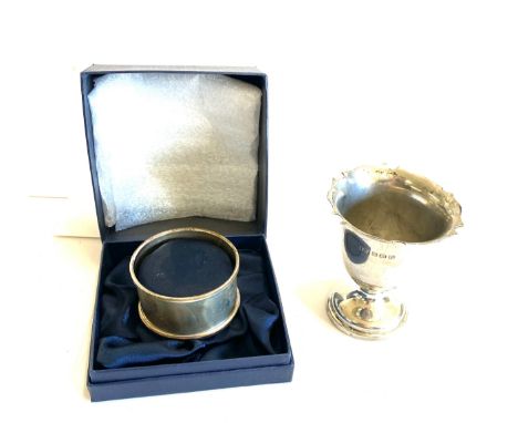 Cased hallmarked silver napkin ring, Silver hallmarked egg cup, approximate weight 52g