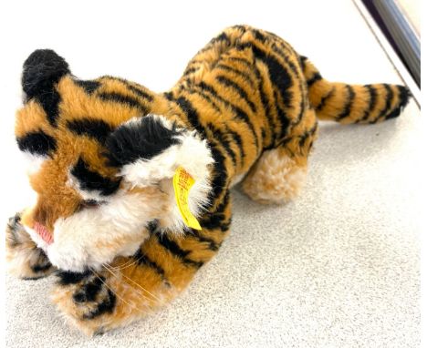 Vintage Steiff tiger stretching, with tags 