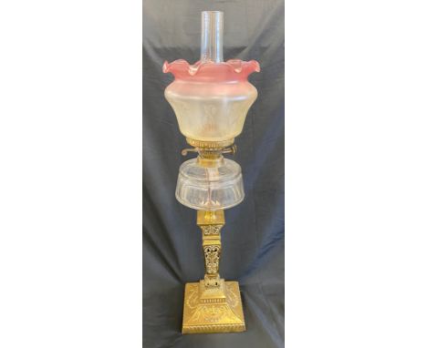 Antique brass oil lamp with shade, with funnel overall height: 30 inches