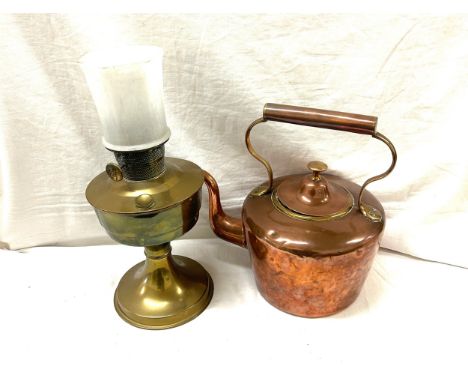 Copper kettle and a brass oil lamp 