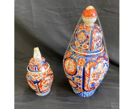 Two vintage oriental Imari lidded vases- largest measures 11.5 inches tall
