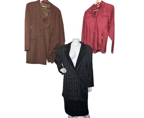 A 1980s brown cashmere blend kilt suit by ravens, and a stiped suit with oversized jacket and pencil skirt by Comma plus a br