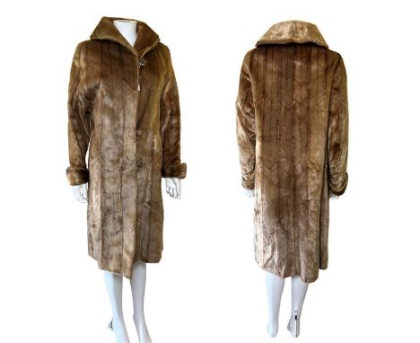 A C1930s dyed harp seal coat  with classic 30s zigzag seaming 14.5 inch/37 cm shoulders, 44 inch/112 cm bust (1) *there may b