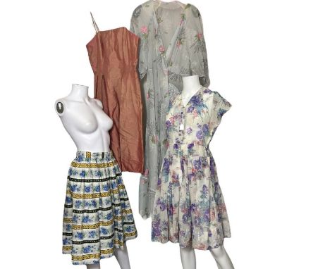 A 1950s rose print robe with feature pocket, a floral cotton skirt, a floral print day dress with side metal zipper and shirt