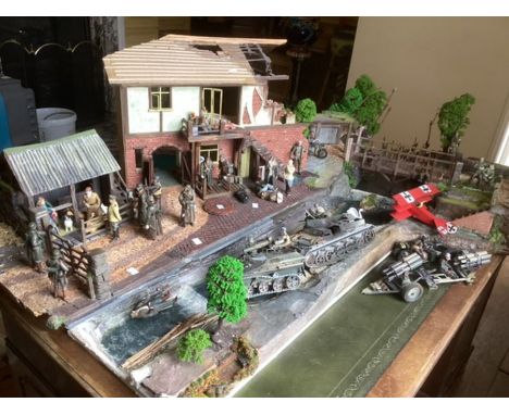  A  wonderfully detailed World War Two finely modelled diorama with a quantity of models plus a Red Baron biplane model, two 