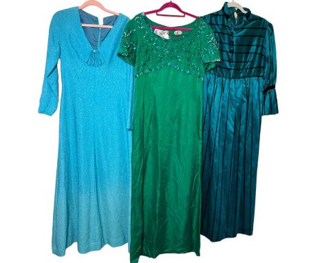 3 vintage evening gowns to include one in emerald green silk by Julian Rose, one in a jade green and black stripe with Shampe