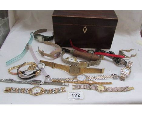 A mixed lot of watches in a Victorian tea caddy