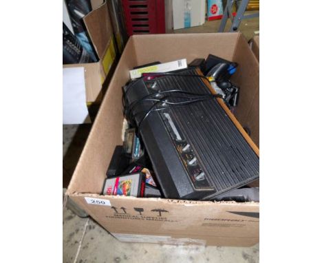 A collection of vintage Atari consoles with many games and accessories