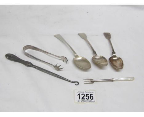 6 items of silver including sugar nips, spoons and button hook