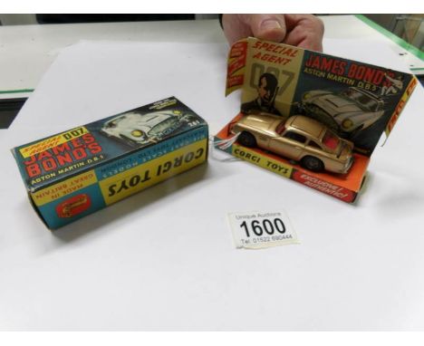 A Corgi 261 James Bond Aston Martin D.B.S first issue in gold, very near mint and in original very good condition box