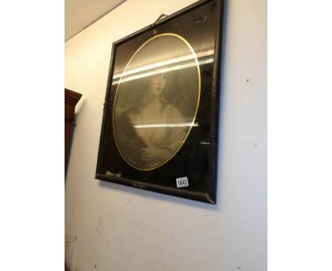 An oval portrait print of a girl