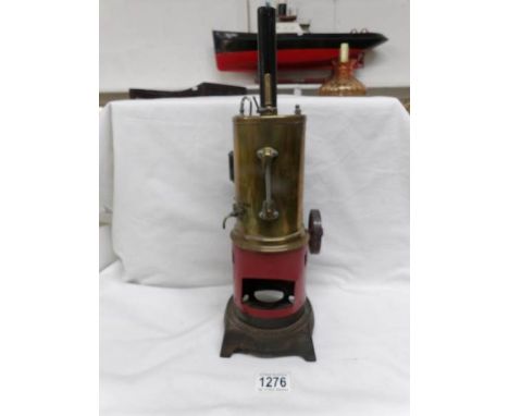 A large upright stationery steam engine by D & Co., Germany