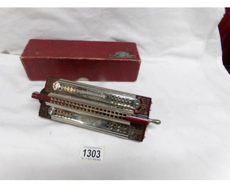 A rare boxed Hohner paddle wheel tremolo harmonica