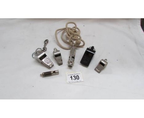 A collection of vintage whistles