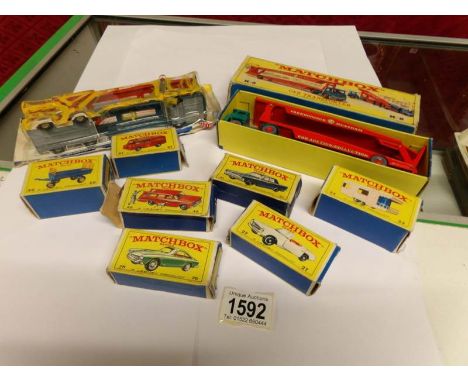 A boxed  Matchbox K.8 car transporter, 7 boxed Matchbox models and a Husky transporter