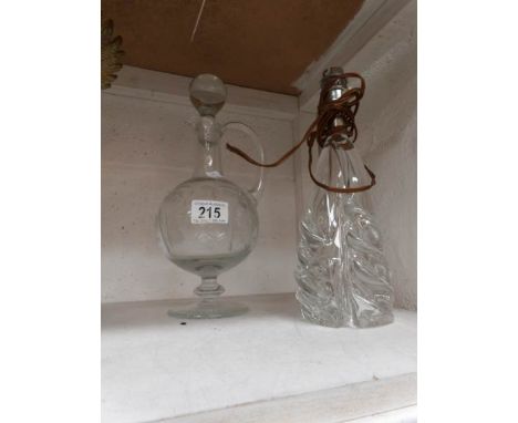 An art deco glass table lamp base and an etched glass decanter