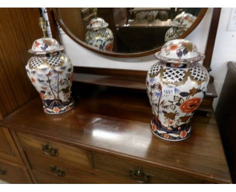A pair of ginger jars converted to lamp bases