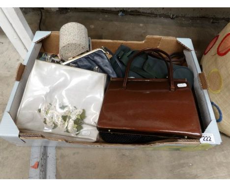 A quantity of vintage hand bags and miniature dolls
