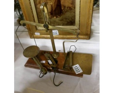 A set of Victorian brass post office balance scales and 3 sets of brass balance scales