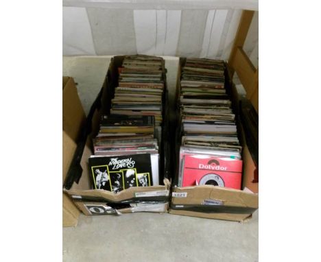 In excess of 480 45 rpm records in 2 boxes including Black Sabbath, Bob Marley, Rolling Stones, David Bowie etc