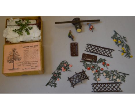 Britains Miniature Gardening. Tree see-saw, scarce floral arch. Together with boxed. New model tree, appears complete.