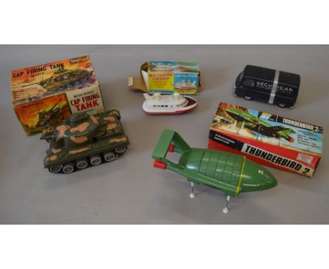 Marx Cap Firing Tank together with JR 21 Thunderbird 2 and two other plastic vehicles (4)