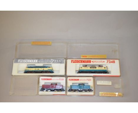 N Gauge. Fleischmann. 4 x DB railways locomotives. Overall G. Weathered/painted bogies to one locomotive.

