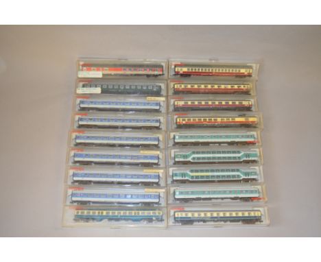 N Gauge. Fleischmann. 18 x DB railways coaching stock. Various liveries. VG in G boxes.