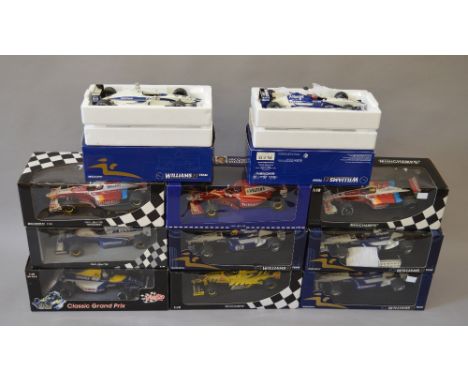 11 x Minichamps/Quartzo 1:18 scale diecast model Formula 1 cars.