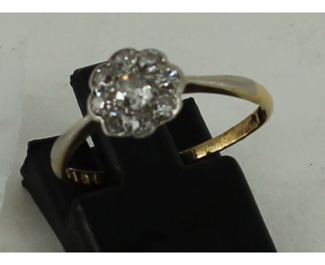 18ct yellow gold diamond cluster ring. Total weight: 1.7g size: N