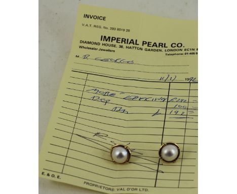 A pair of Gold and Pearl stud earrings with original receipt 