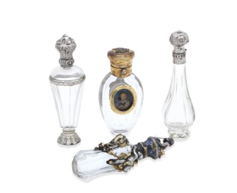 A French parcel-gilt and enamel-mounted glass scent bottlemid 19th century The facetted body and hinged lid applied with a ch