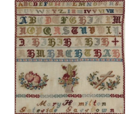 A 19th century sampler worked by Strathconon School ChildrenThe text of seven verses in coloured threads with a trailing bord