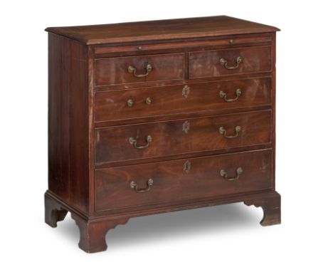 A George III mahogany chestWith a brushing slide above two short and three long drawers on bracket feet, 89cm wide x 47cm dee