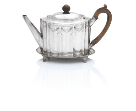 A George III fluted oval teapot and matched standby James Mince, London 1794 Bright-cut engraved with swags of foliage, and w