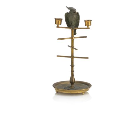 A Victorian novelty gilt brass inkstand candlestickFormed as a cockatiel perched on a column, the hinged head opening to reve