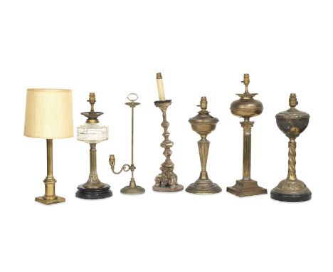 A collection of table lampsIncluding;A brass column lamp with a plinth base engraved, 'HONEYSUCKLE ROOM',Three brass oil lamp