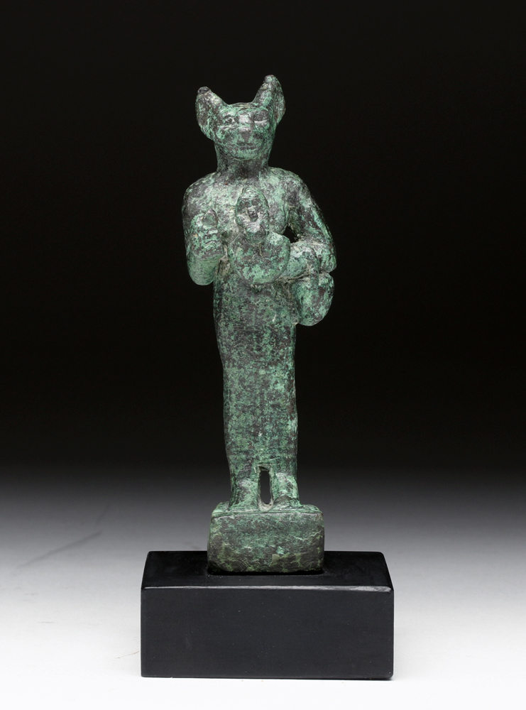 Egyptian Bronze Bastet Holding Aegis and Basket Egypt, Late Period, ca