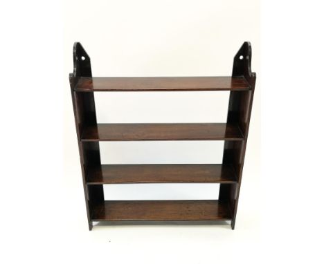 A 19th century mahogany four tier hanging wall shelf, 76cm high x 62cm wide x 14cm deep