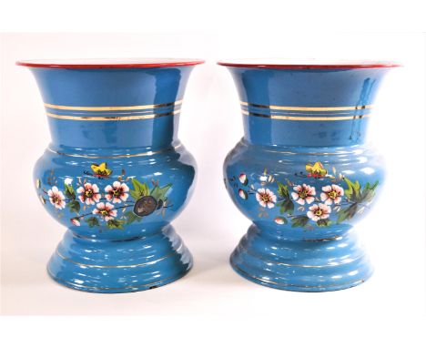 A pair of enamel wine coolers, of bellied Campana form, decorated with floral sprays on a turquoise ground, 24cm high