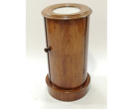 A Victorian mahogany cylindrical pot cupboard, with inset m,arble top and plinth base, 71cm high