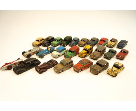 A collection of play worn Dinky cars